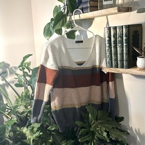 Rust, pink, and grey meet white and gold! Chic medium weight sweater